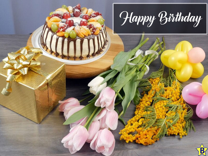 happy birthday cake flowers and balloons photo